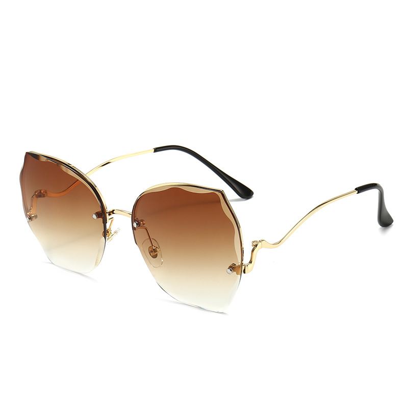 Ny Stil Rammeløse Cut-edge Kvinders Solbriller Ocean Lens Solbriller Europæisk Og Amerikansk Trendy Mode Farve Briller 6021