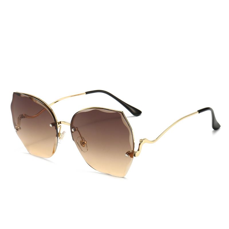 Ny Stil Rammeløse Cut-edge Kvinders Solbriller Ocean Lens Solbriller Europæisk Og Amerikansk Trendy Mode Farve Briller 6021