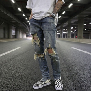 Slim-fit Stretch Jeans Med Store Huller Og Gul Indvendig Lynlås