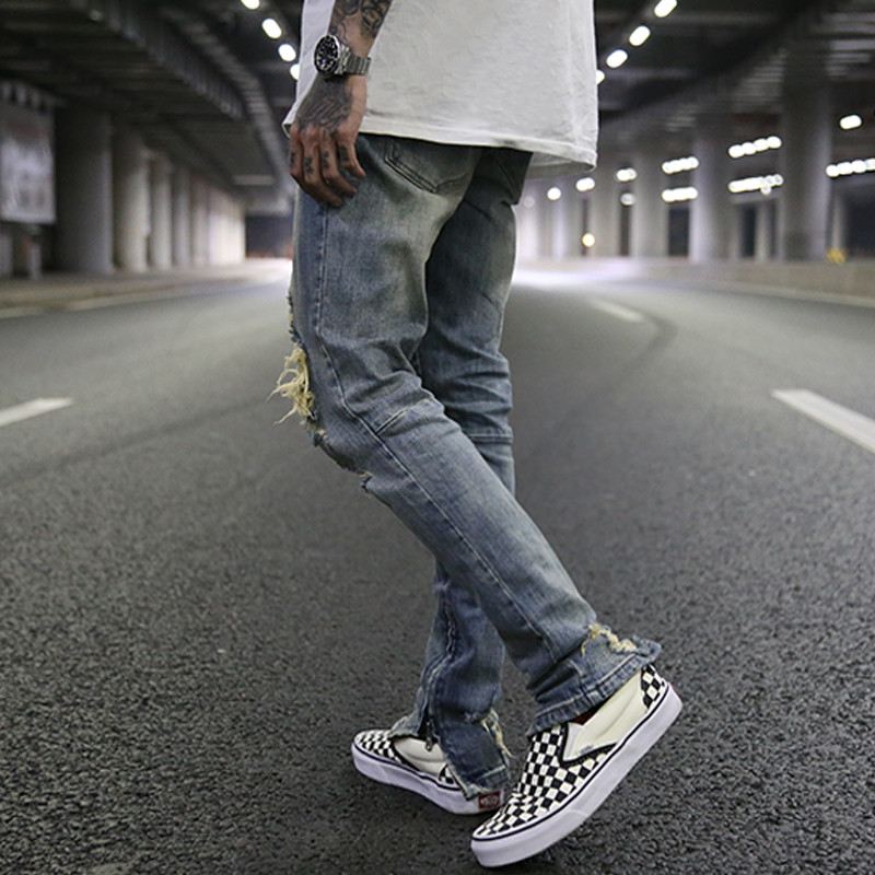 Slim-fit Stretch Jeans Med Store Huller Og Gul Indvendig Lynlås